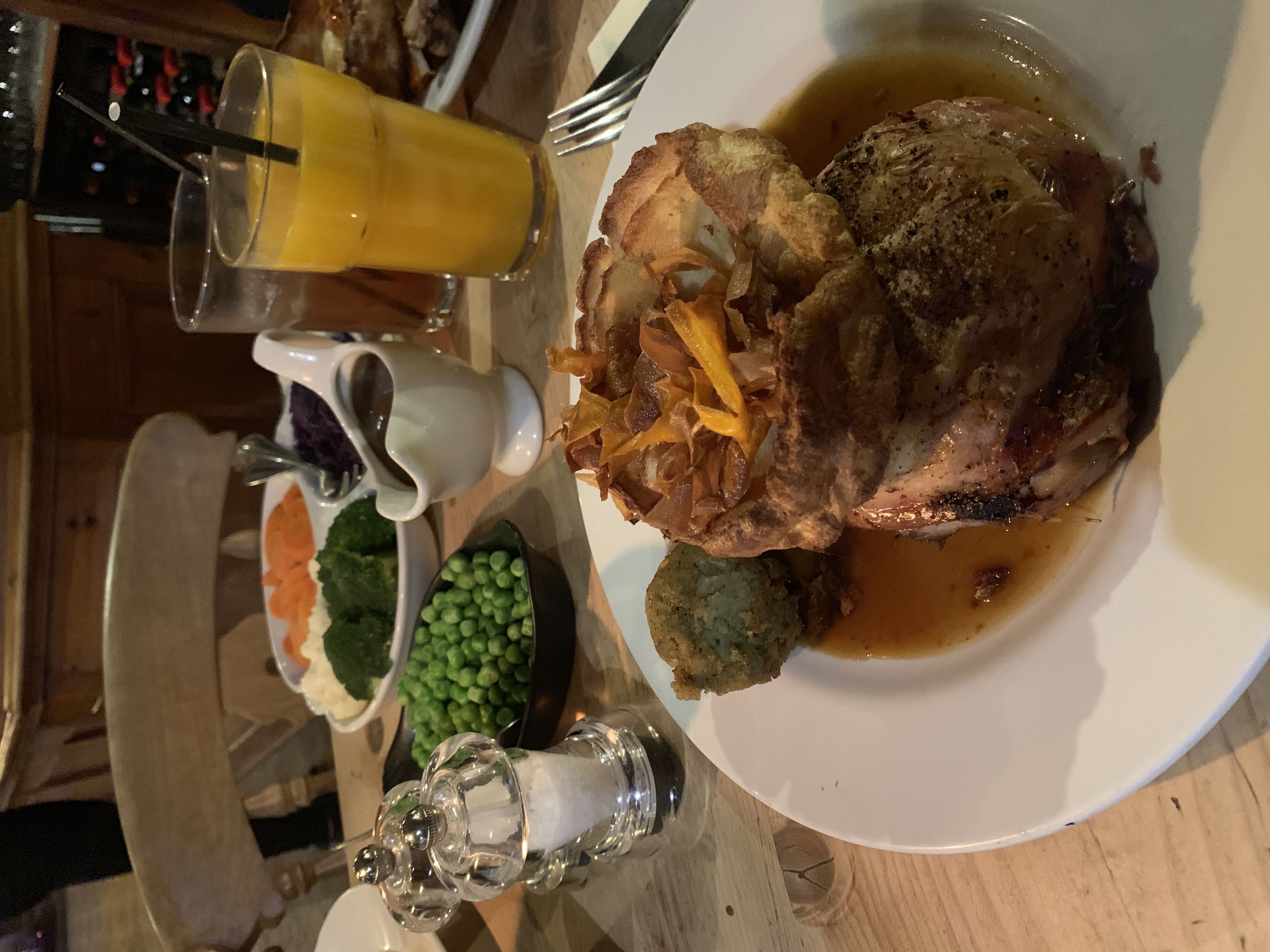A plate of roast beef with gravy