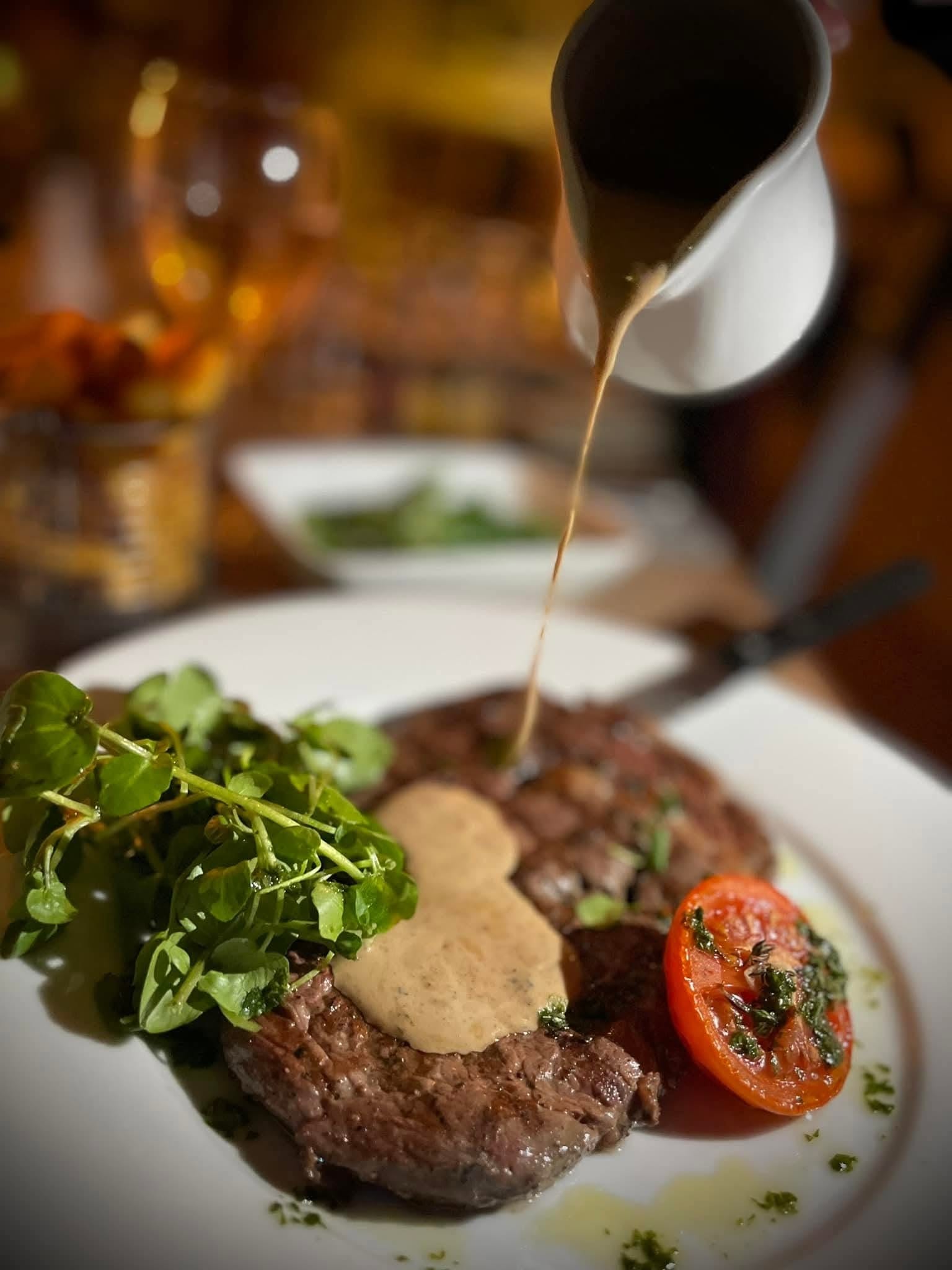 A plate of roast beef with gravy