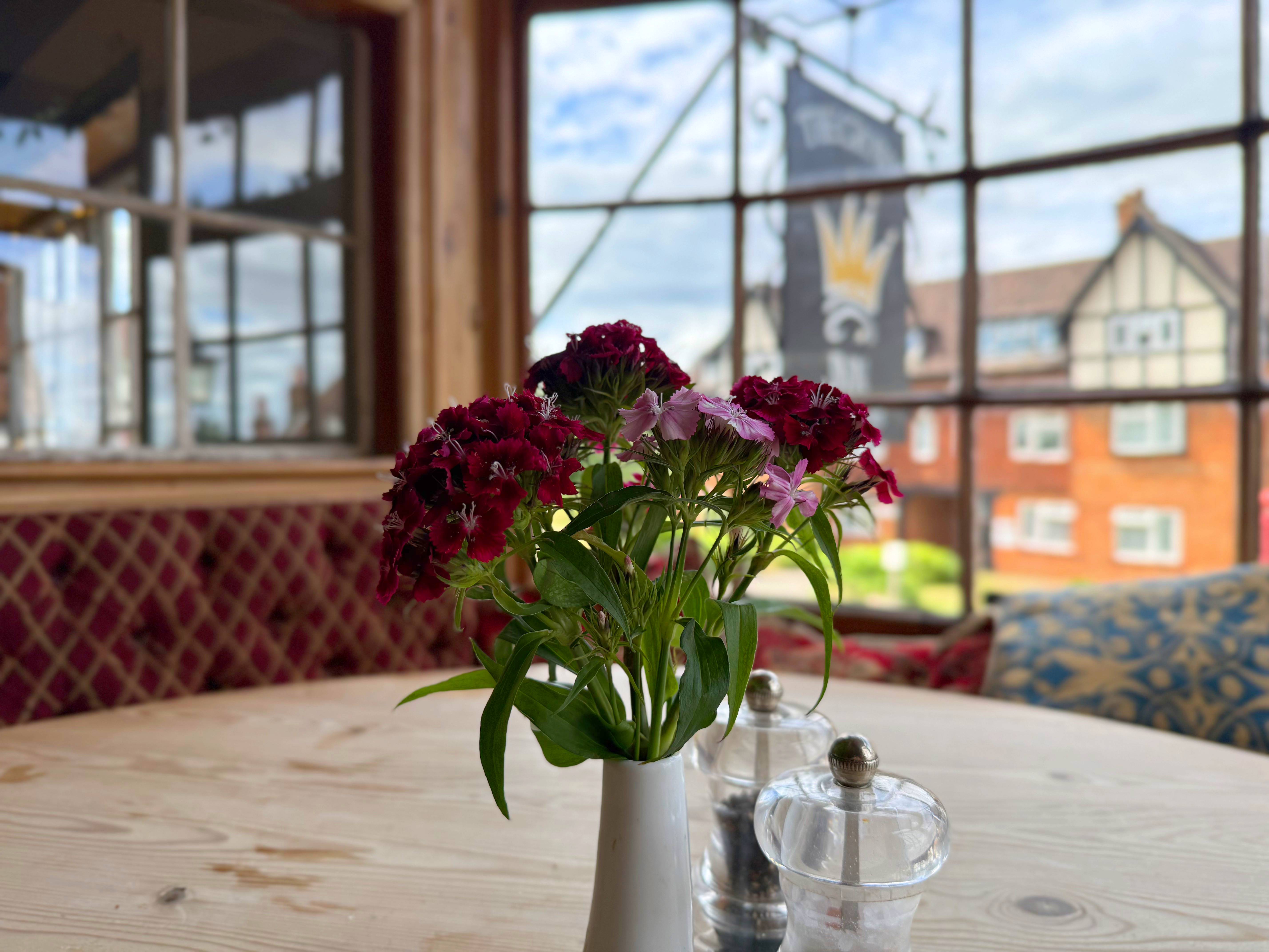 Cosy booth seating inside The Crown